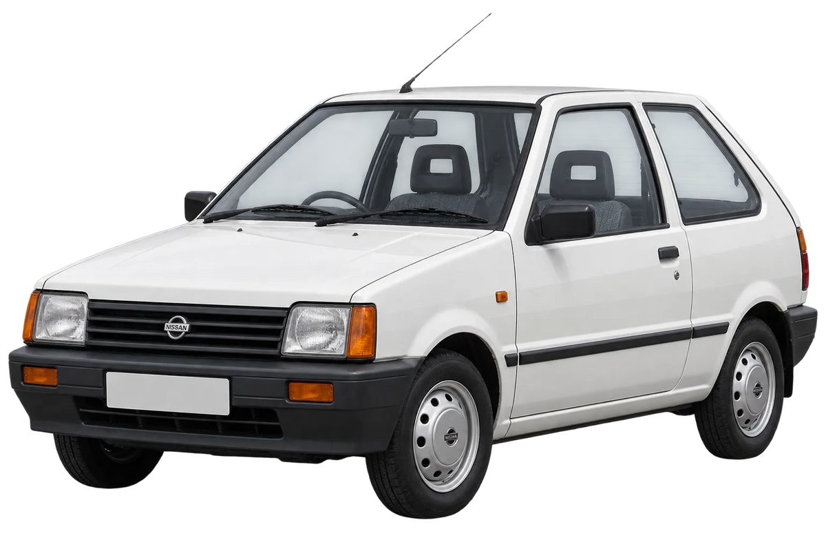 Witte Nissan Micra K10, schuin van voren